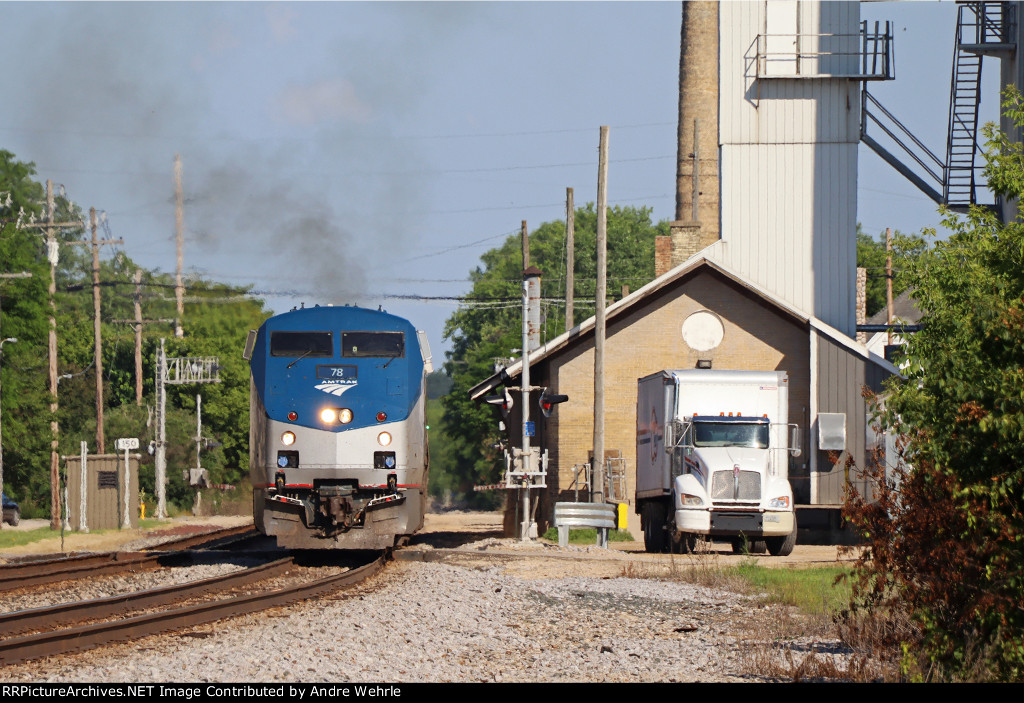 GE smoke starts to burble as No. 7 accelerates out of its stop